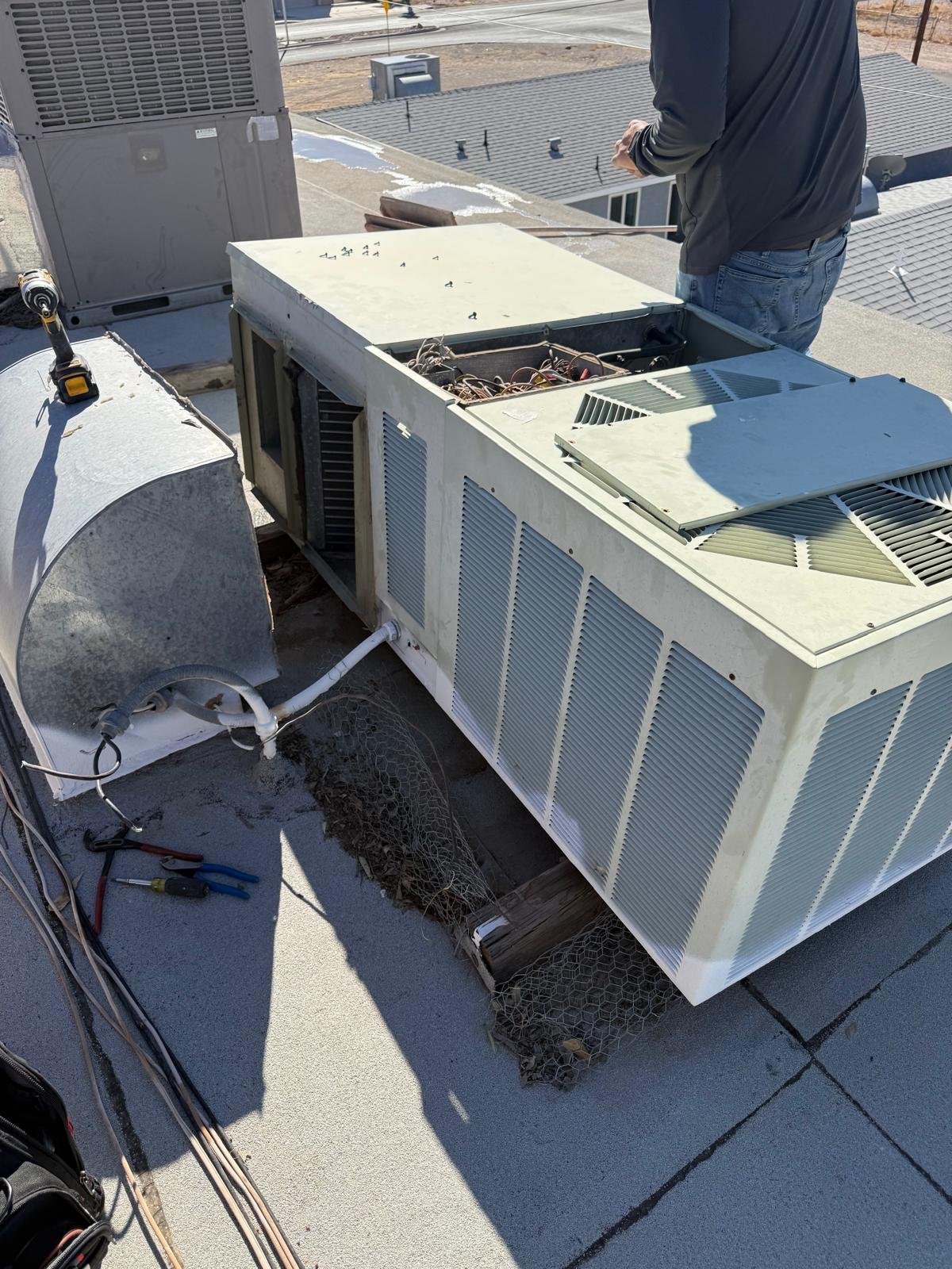 Original rooftop HVAC unit before replacement